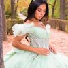 Vestido de Quinceañera verde menta corte princesa con encaje floral